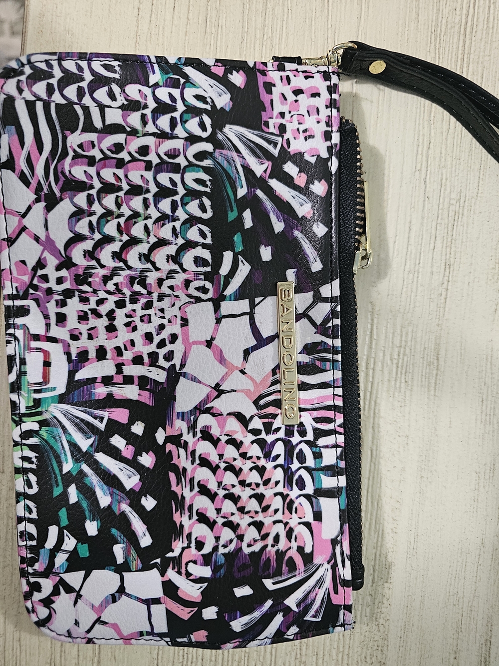 Bandolino Black Abstract Multi-Color Wristlet with Gold Logo